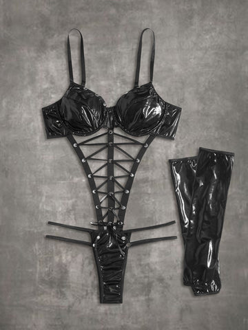Women's black goth teddy bodysuit featuring front lace-up details, cut-out accent, adjustable spaghetti straps, paired with matching oversleeves.