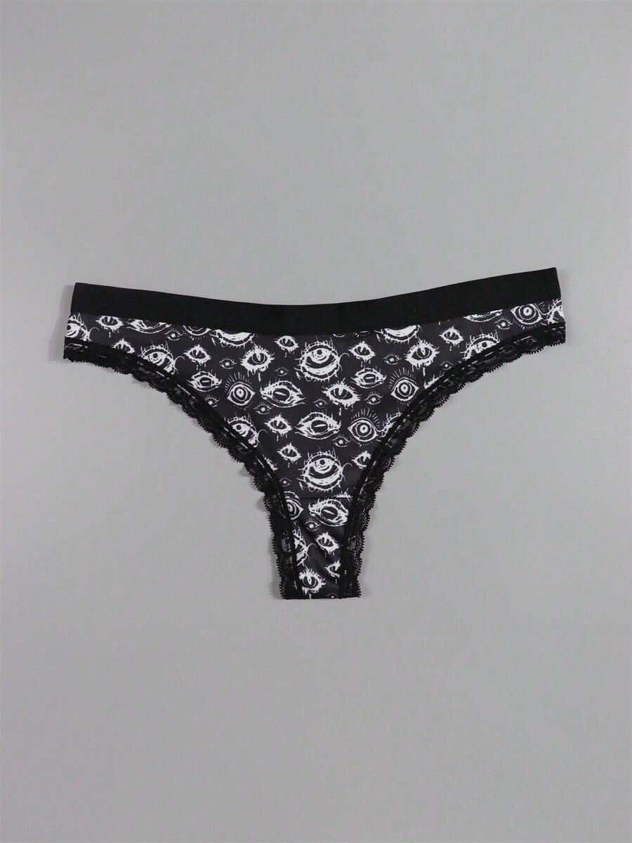 Four-piece women's gothic low rise thongs set with contrast lace trim and multicolor Halloween skull print.