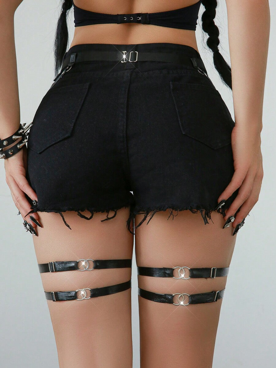 Women's black goth faux leather underwear garter with ring detail and cut-out design.