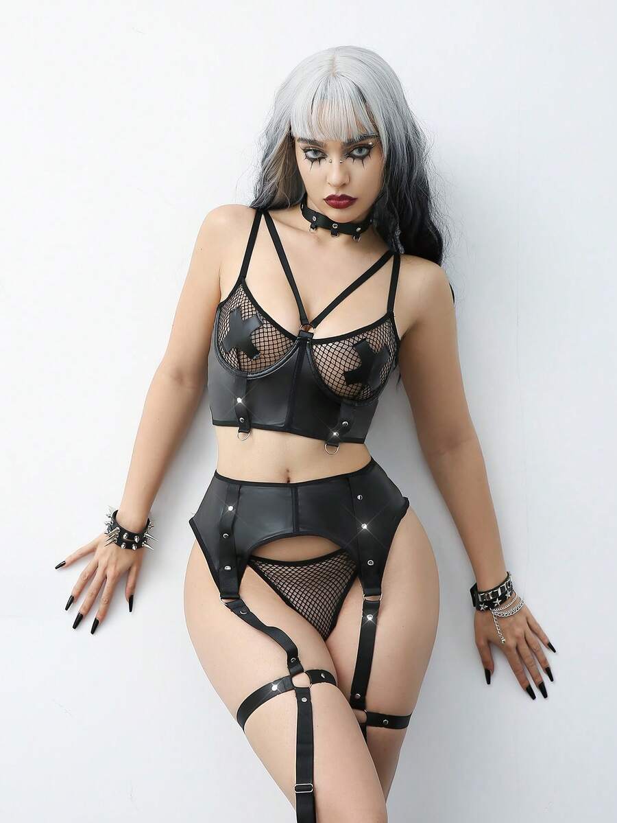 Black 4-piece women's corset lingerie set with fishnet inserts, ring details, garter, adjustable straps, demi bra, and matching thong.