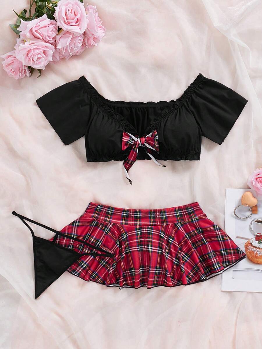 Black 3-piece tartan frill trim costume lingerie set featuring a sweetheart neckline bralette with adjustable straps, matching thong panty, and short skirt.