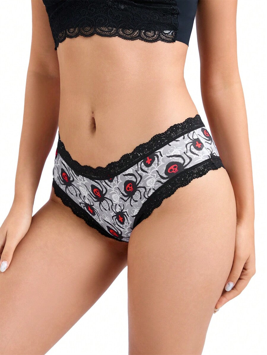 A 10-pack set of multicolor women's low-rise hipster panties featuring contrast lace trim and allover Halloween prints of skulls, eyeballs, stars, and jack-o-lanterns.