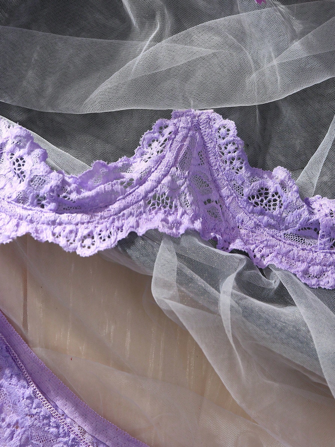 Women's sheer lace underwire bra and thong set with open cup bra, adjustable spaghetti straps, and matching low rise V-string thong in a 2-piece lingerie set.
