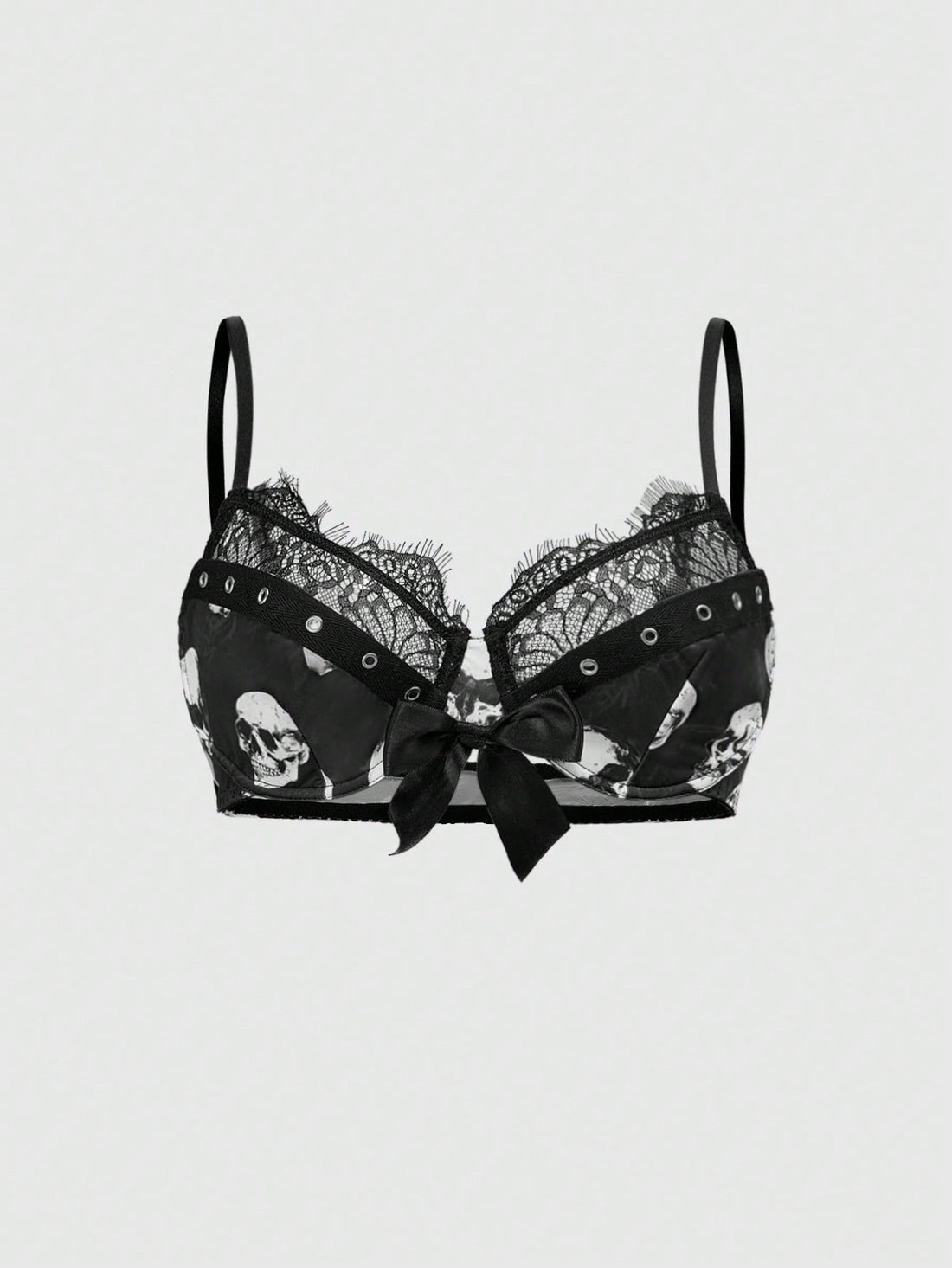Black dark gothic skull print lingerie bra featuring contrast lace trim, bow accent, underwire balconette cups, and adjustable shoulder straps.