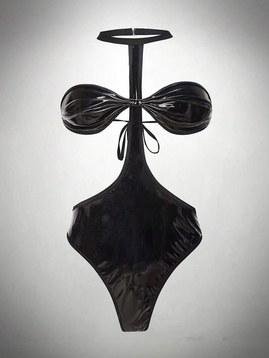Black 2-piece goth lingerie set featuring a neck-tie bustier micro crop top and high-rise garter thong panty with adjustable straps.