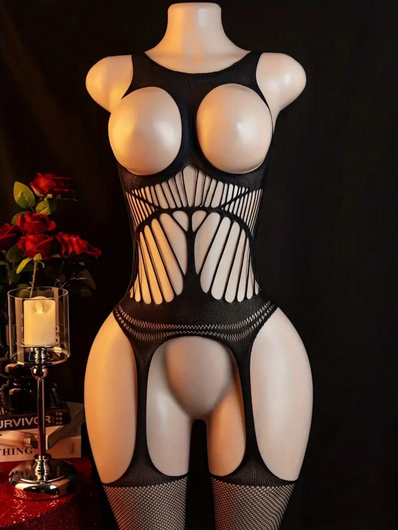 Women's black sheer lingerie bodysuit with cut-out and backless design, spaghetti straps, underwire full cup, and high-stretch polyamide elastane fabric.