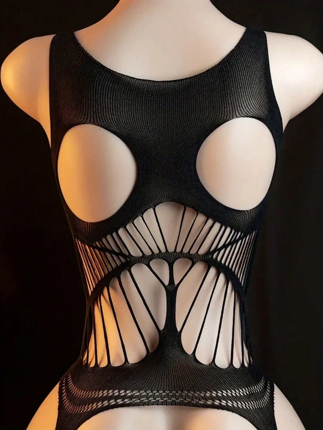 Women's black sheer lingerie bodysuit with cut-out and backless design, spaghetti straps, underwire full cup, and high-stretch polyamide elastane fabric.