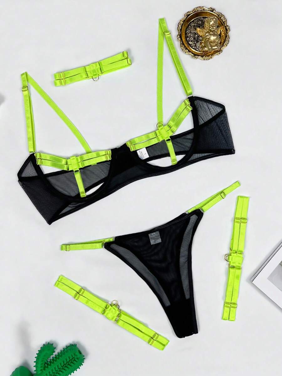 Fluorescent green 4-piece lingerie set for women featuring a sheer embroidered cut-out triangle bra with underwire, matching thong, leg garter, and collar.