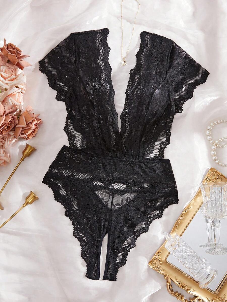 Black floral lace crotchless teddy bodysuit for women featuring a deep V-neckline, cut-out details, sheer unlined lace fabric, and removable padding.