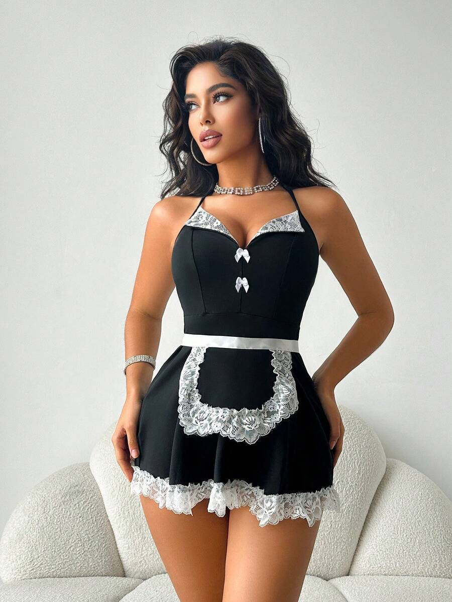 Black halter roleplay costume dress set featuring contrast lace, decorative bow, and adjustable shoulder straps.