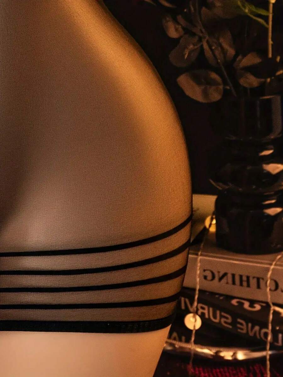 Black sheer striped long sleeve babydoll lingerie for women crafted from high stretch knitted fabric.