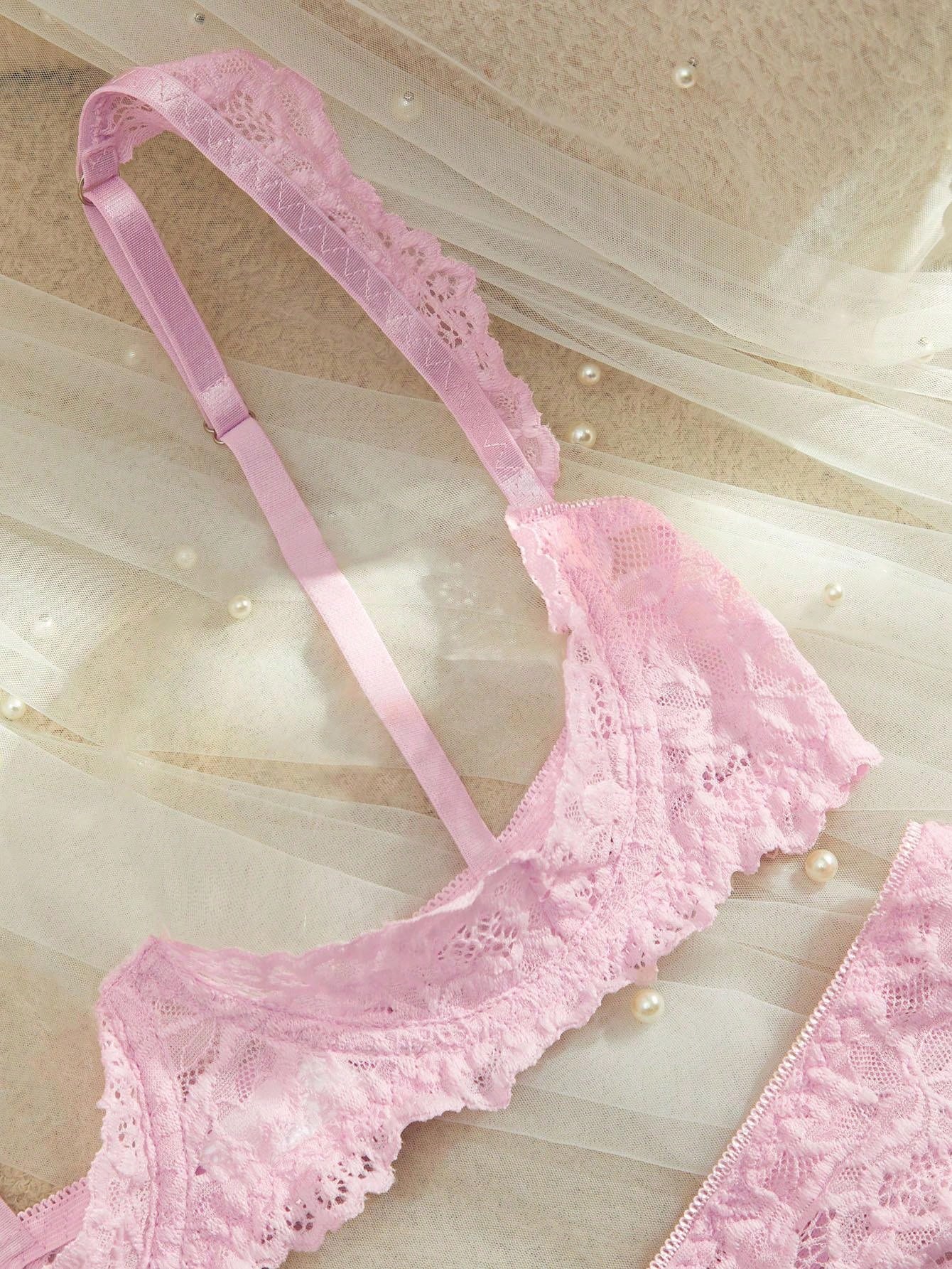 Women's sheer lace underwire bra and thong set with open cup bra, adjustable spaghetti straps, and matching low rise V-string thong in a 2-piece lingerie set.