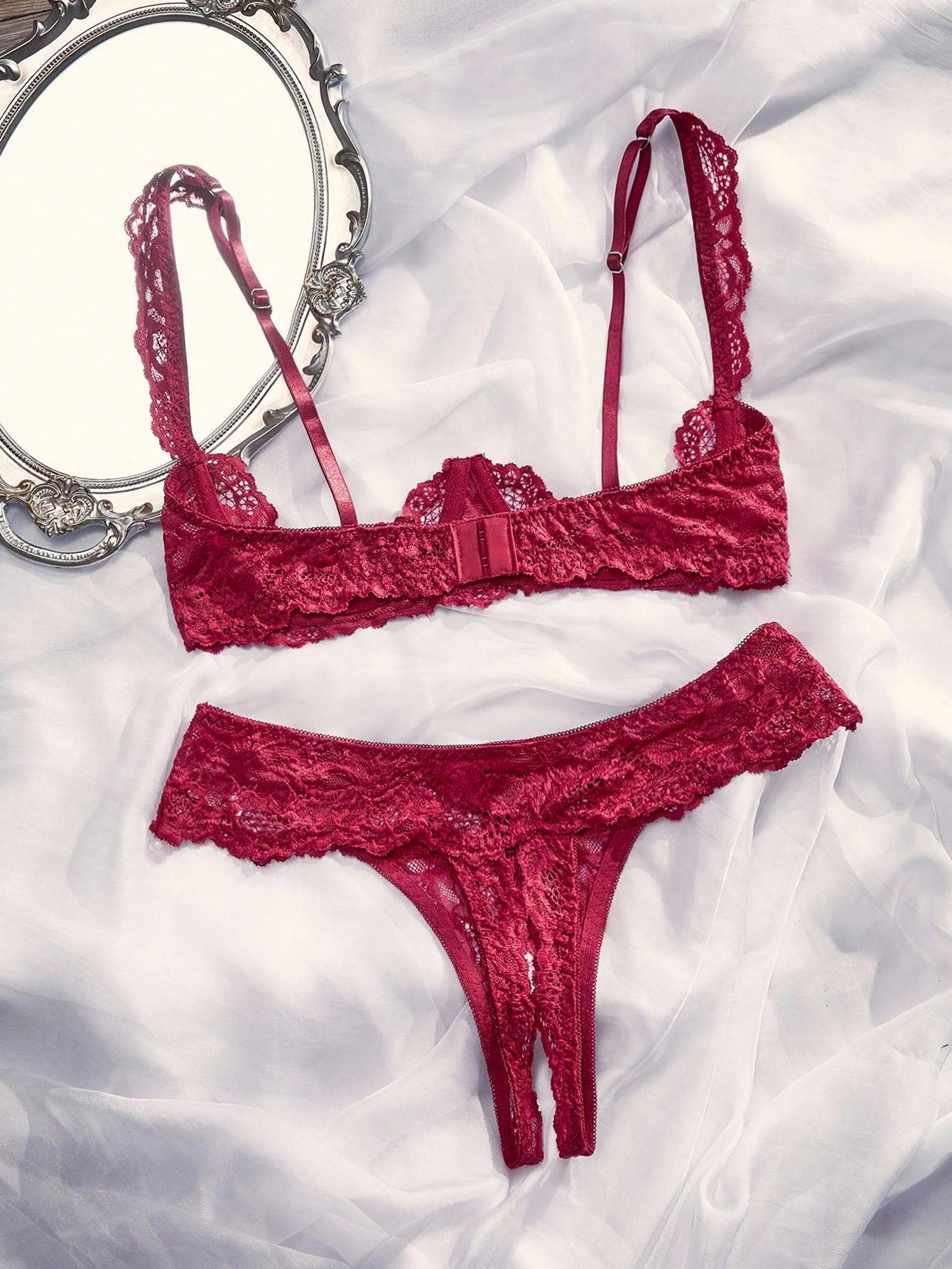 Women's sheer lace underwire bra and thong set with open cup bra, adjustable spaghetti straps, and matching low rise V-string thong in a 2-piece lingerie set.