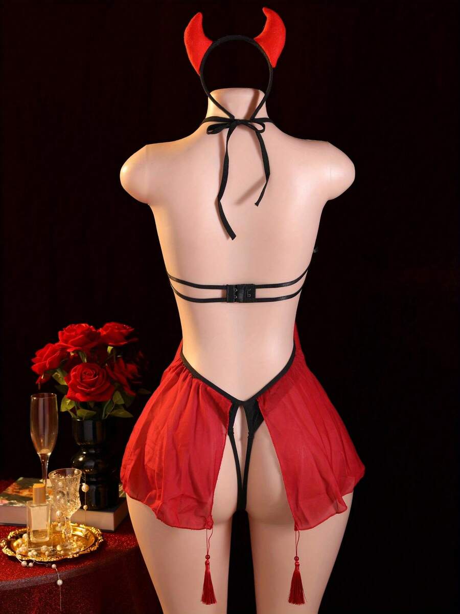 Black goth style demon cosplay lingerie teddy for women featuring halter neckline, backless design, adjustable straps, and low rise V-string bottom.