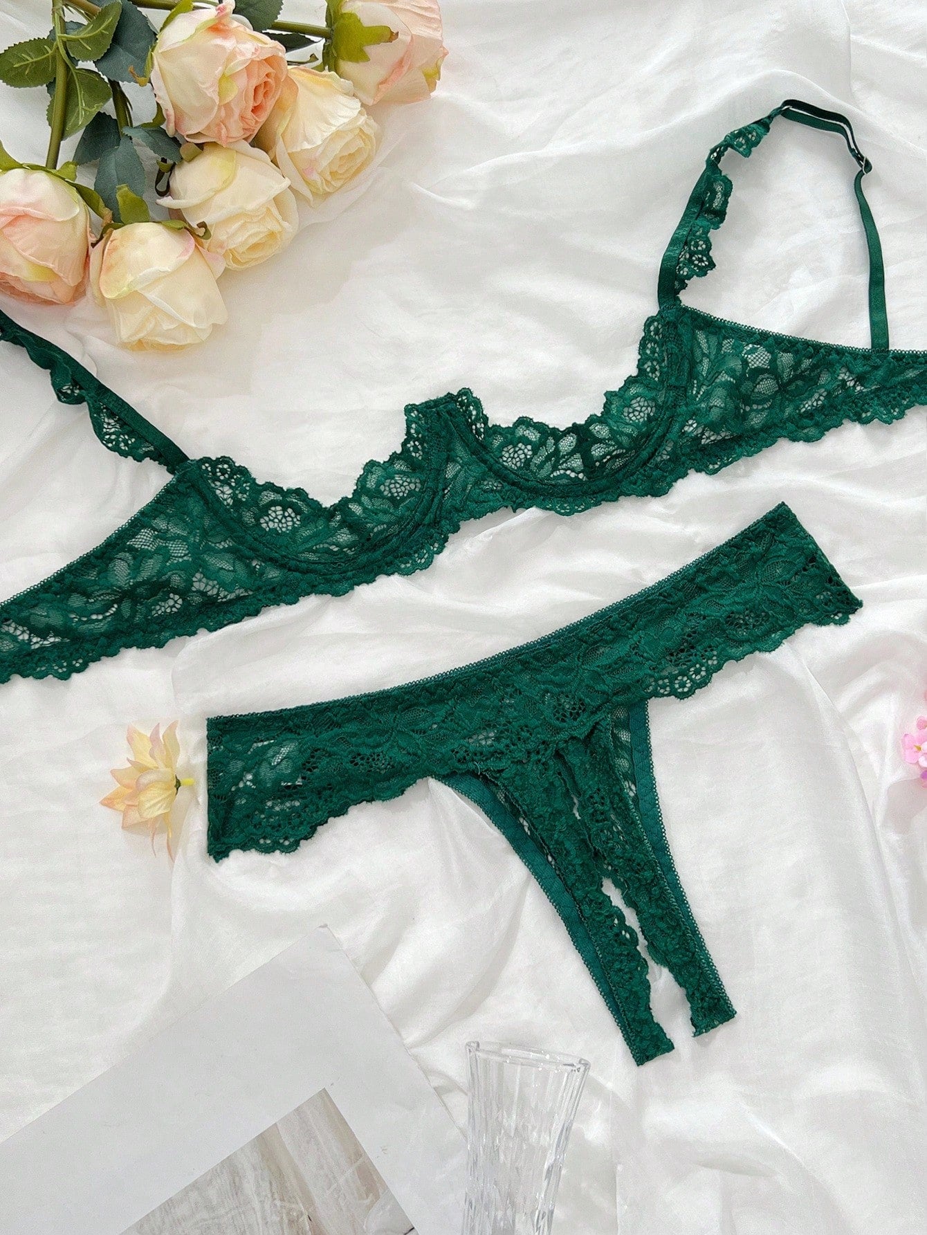 Women's sheer lace underwire bra and thong set with open cup bra, adjustable spaghetti straps, and matching low rise V-string thong in a 2-piece lingerie set.