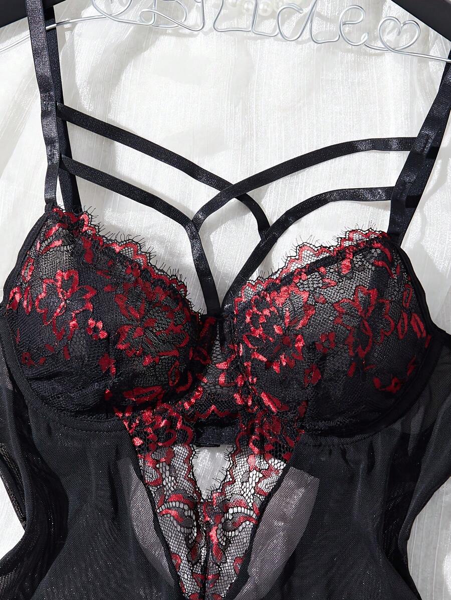 Black sheer lace camisole bodysuit for women featuring floral embroidery, underwire cups, bow details, adjustable spaghetti straps, and a thong bottom.