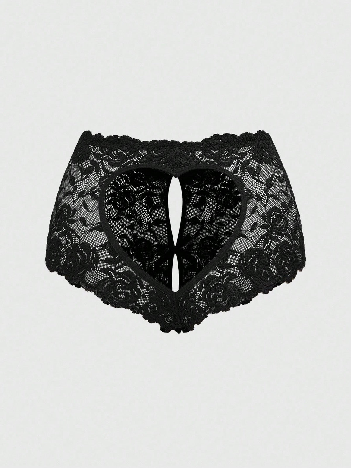 Black lace crotchless panties featuring a gothic hollow heart cutout design in sheer mid-rise fabric for women.