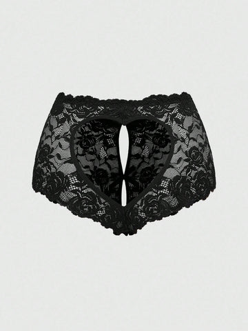 Black lace crotchless panties featuring a gothic hollow heart cutout design in sheer mid-rise fabric for women.