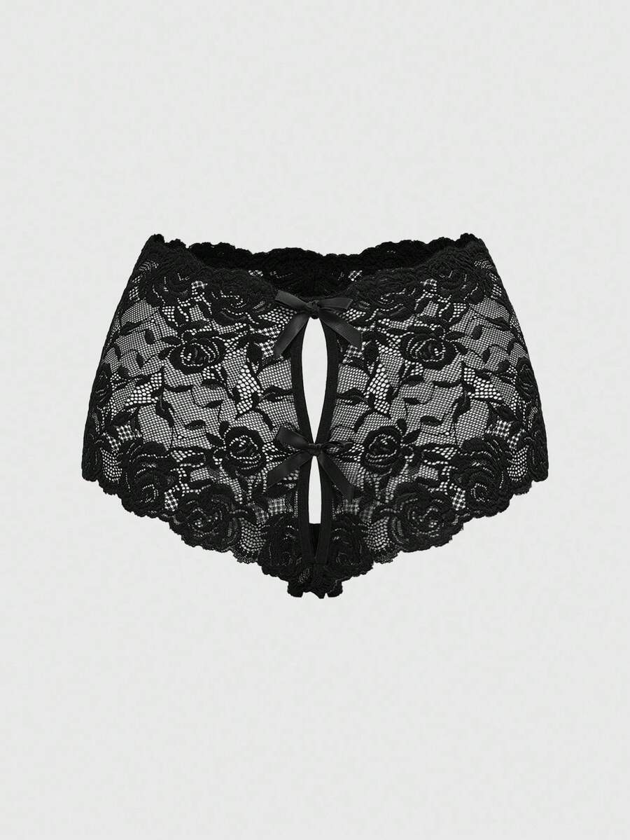 Black lace crotchless panties featuring a gothic hollow heart cutout design in sheer mid-rise fabric for women.