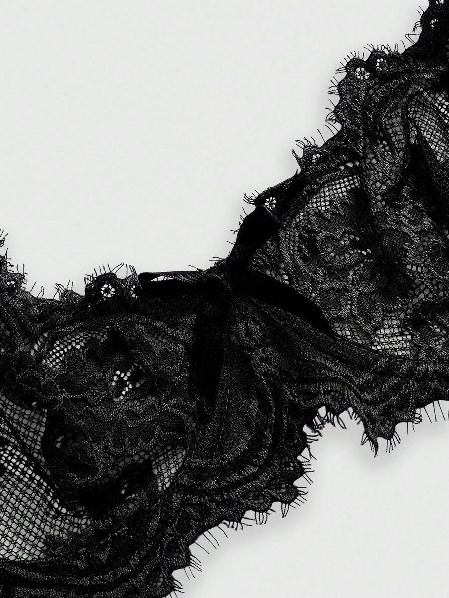 Black sheer floral lace plunge bra featuring underwire support, unlined triangle cups, adjustable straps, and a backless design for women.