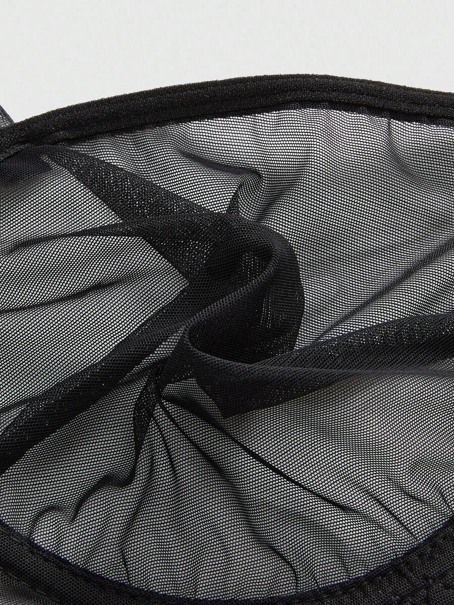 Black sheer mesh plus size bralette featuring adjustable spaghetti straps and dark goth style.