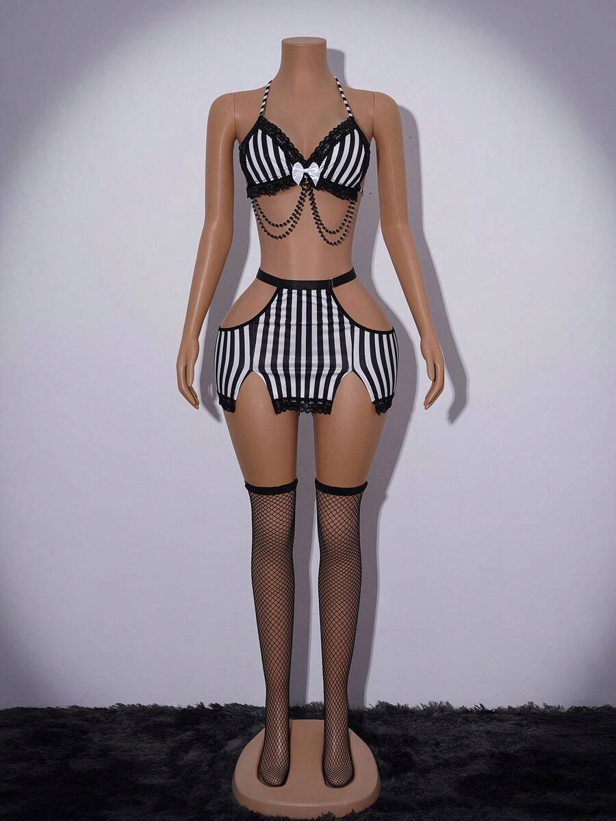 Black and white striped 4-piece Halloween halter lingerie set for women featuring a wireless crop bralette with contrast lace trim and bow knot details.