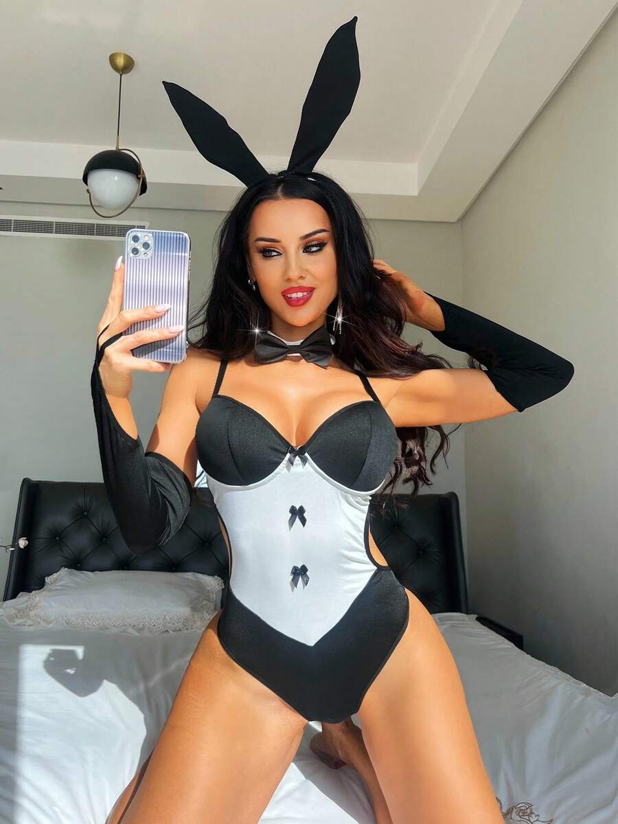 Black and white 4-piece rabbit cosplay bodysuit set featuring contrast lace detailing, underwire support, and adjustable spaghetti straps.
