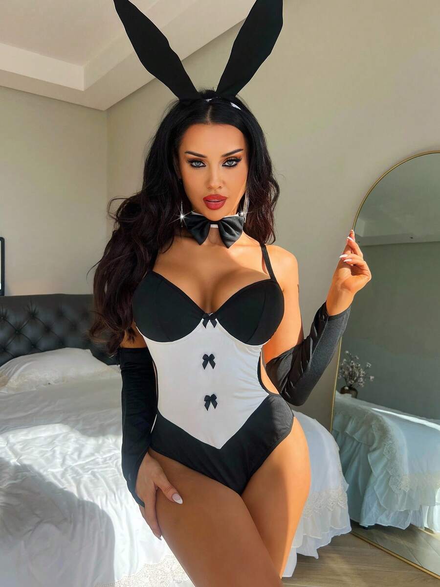 Black and white 4-piece rabbit cosplay bodysuit set featuring contrast lace detailing, underwire support, and adjustable spaghetti straps.