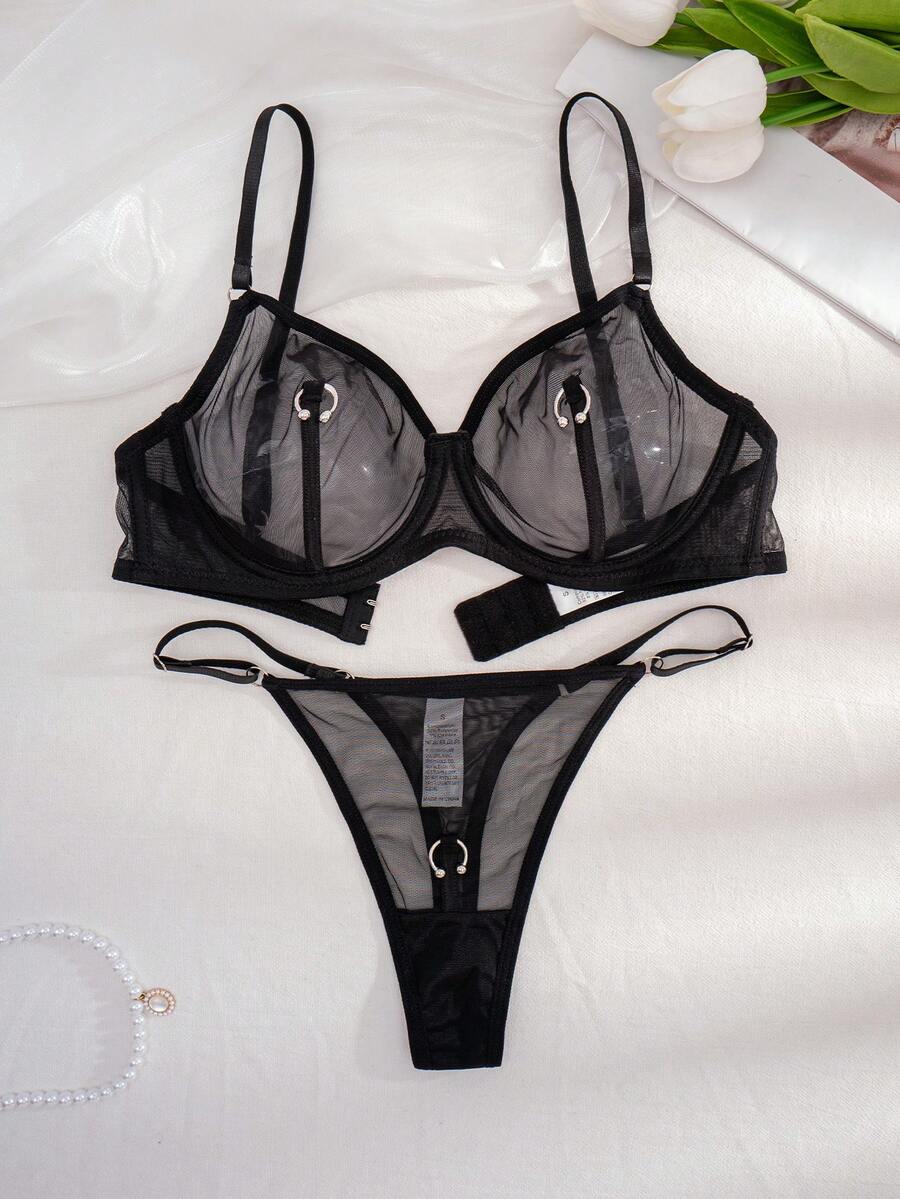 Black sheer 2-piece lingerie set for women featuring a backless underwire bra with clear straps and a matching low-rise thong.