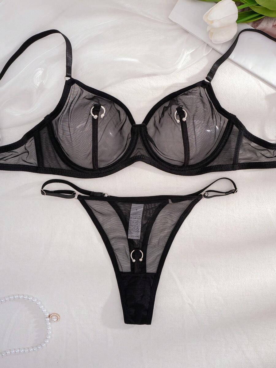 Black sheer 2-piece lingerie set for women featuring a backless underwire bra with clear straps and a matching low-rise thong.