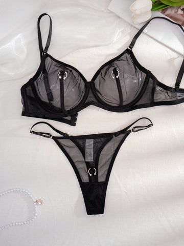 Black sheer 2-piece lingerie set for women featuring a backless underwire bra with clear straps and a matching low-rise thong.
