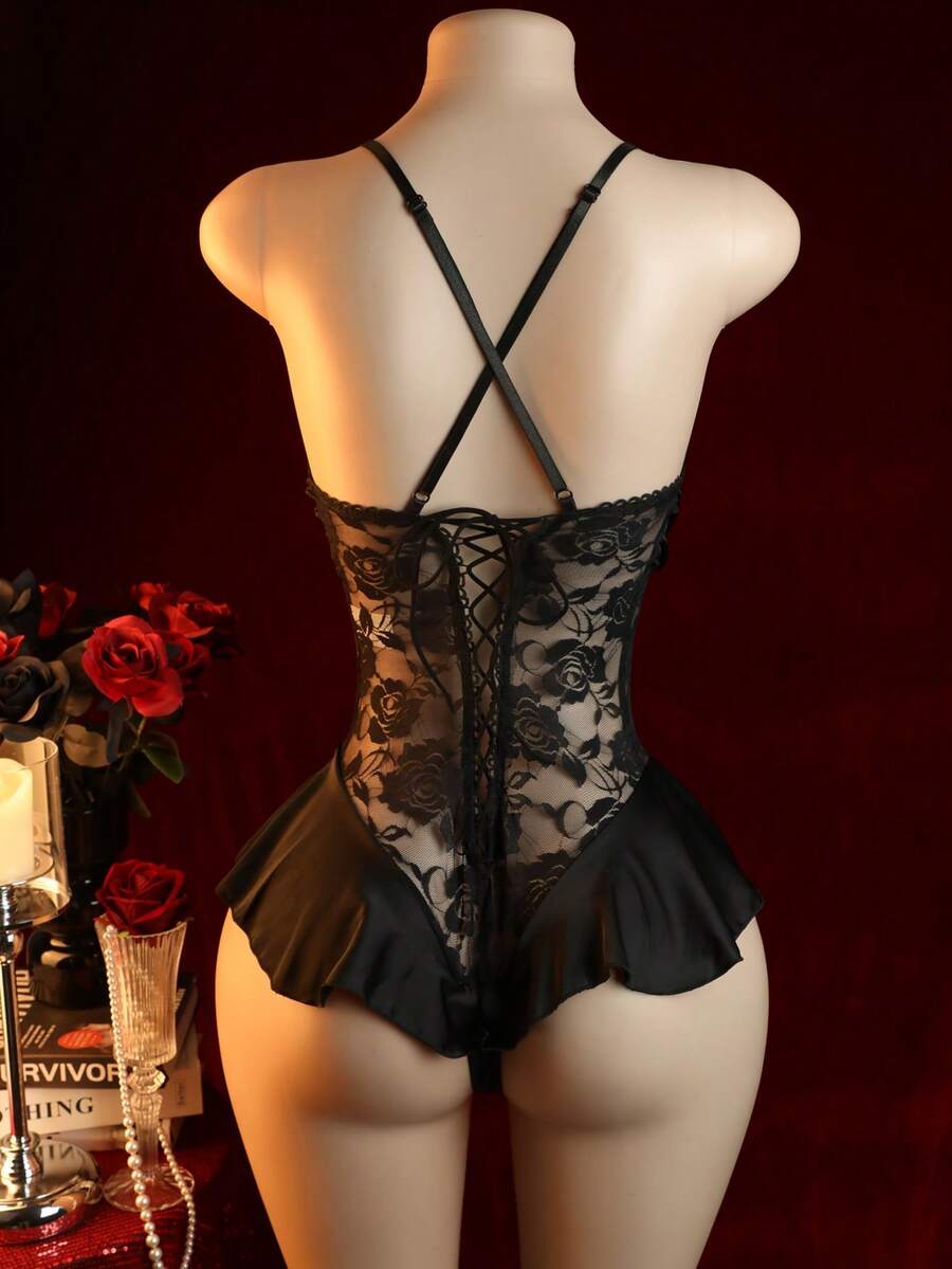 Women's black lace lingerie bodysuit crafted from semi-sheer mesh fabric, featuring contrast lace detailing, wireless briefs, and a sleeveless silhouette.