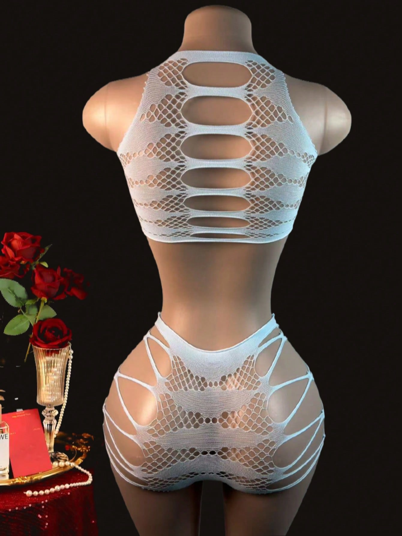 Women's 2-piece lace jumpsuit lingerie set with wireless full cup design, sleeveless crop styling, semi-sheer look, and high-stretch knitted fabric.