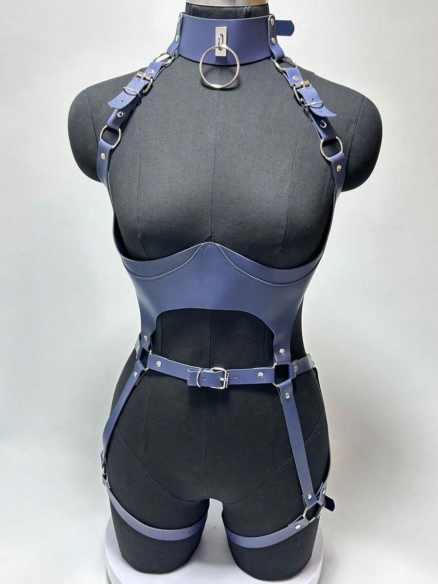 Black PVC leather harness lingerie set for women featuring ring details, restraint straps, thigh garters, and goth Y2K style.