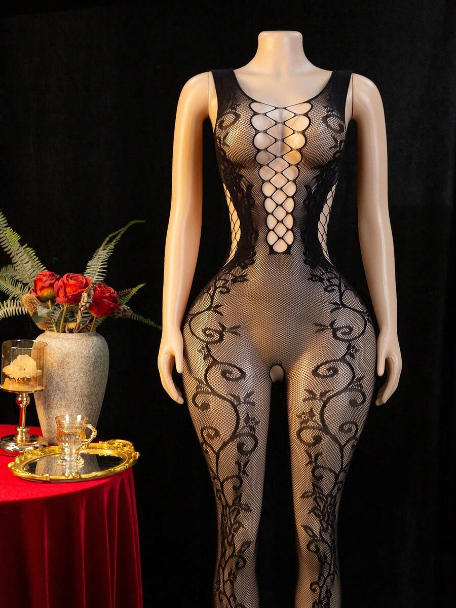 Women's black hollow out mesh bodystocking featuring adjustable straps, scoop neck, and sheer high-stretch fabric