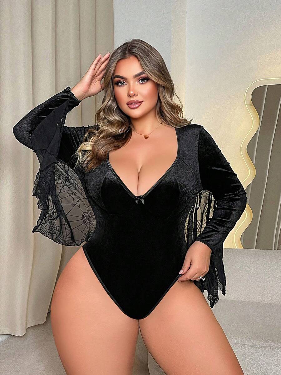Black plus size underwire teddy lingerie featuring a deep V-neckline, bow detail, and adjustable straps.