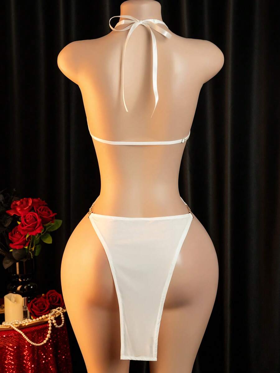 White backless hollow-out lingerie jumpsuit for women with slim fit design