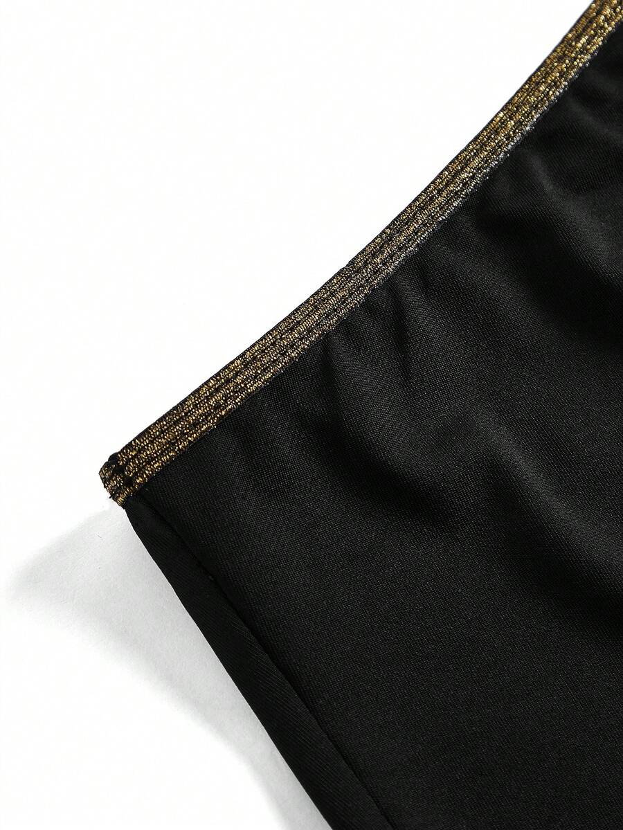 Women's black fringed one-shoulder costume dress featuring an asymmetrical neckline, sleeveless short cut, and high-stretch knitted fabric for Halloween cosplay.