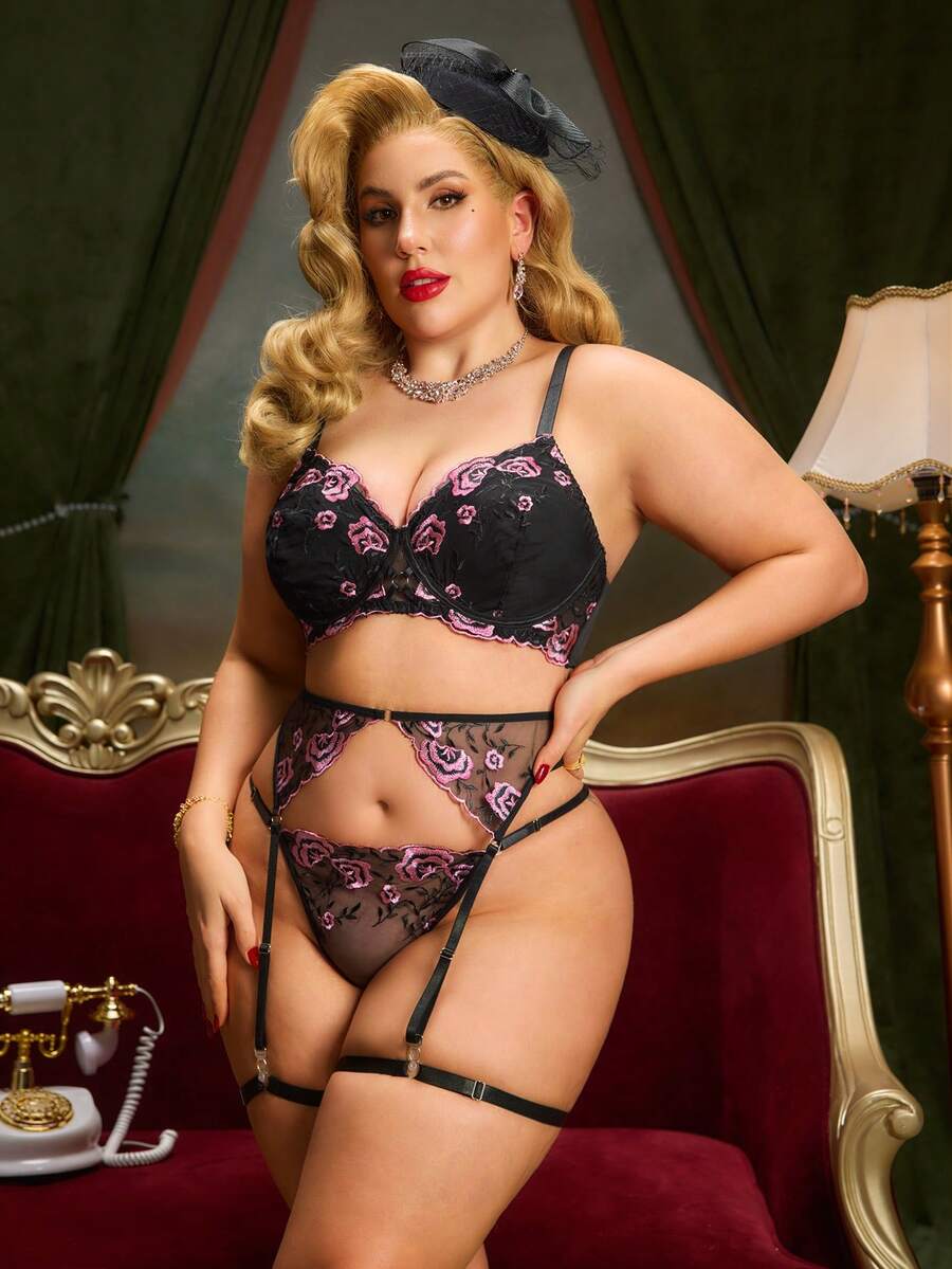 Plus size black babydoll lingerie set with floral embroidery, underwire top, adjustable spaghetti straps, and matching V-string panty.