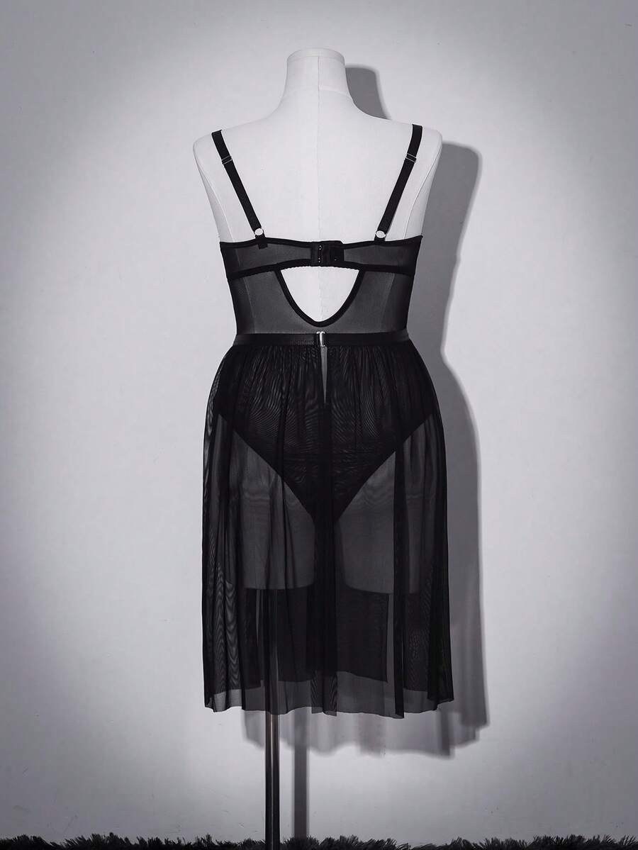 Black plus size sheer mesh babydoll lingerie featuring backless design, ring details, underwire support, and adjustable spaghetti straps.