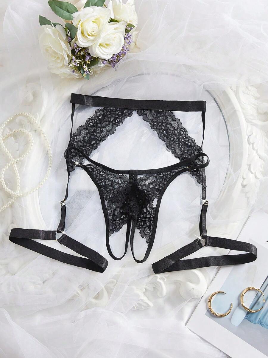 2-piece set of black low rise lace thong panties for women featuring cut out details