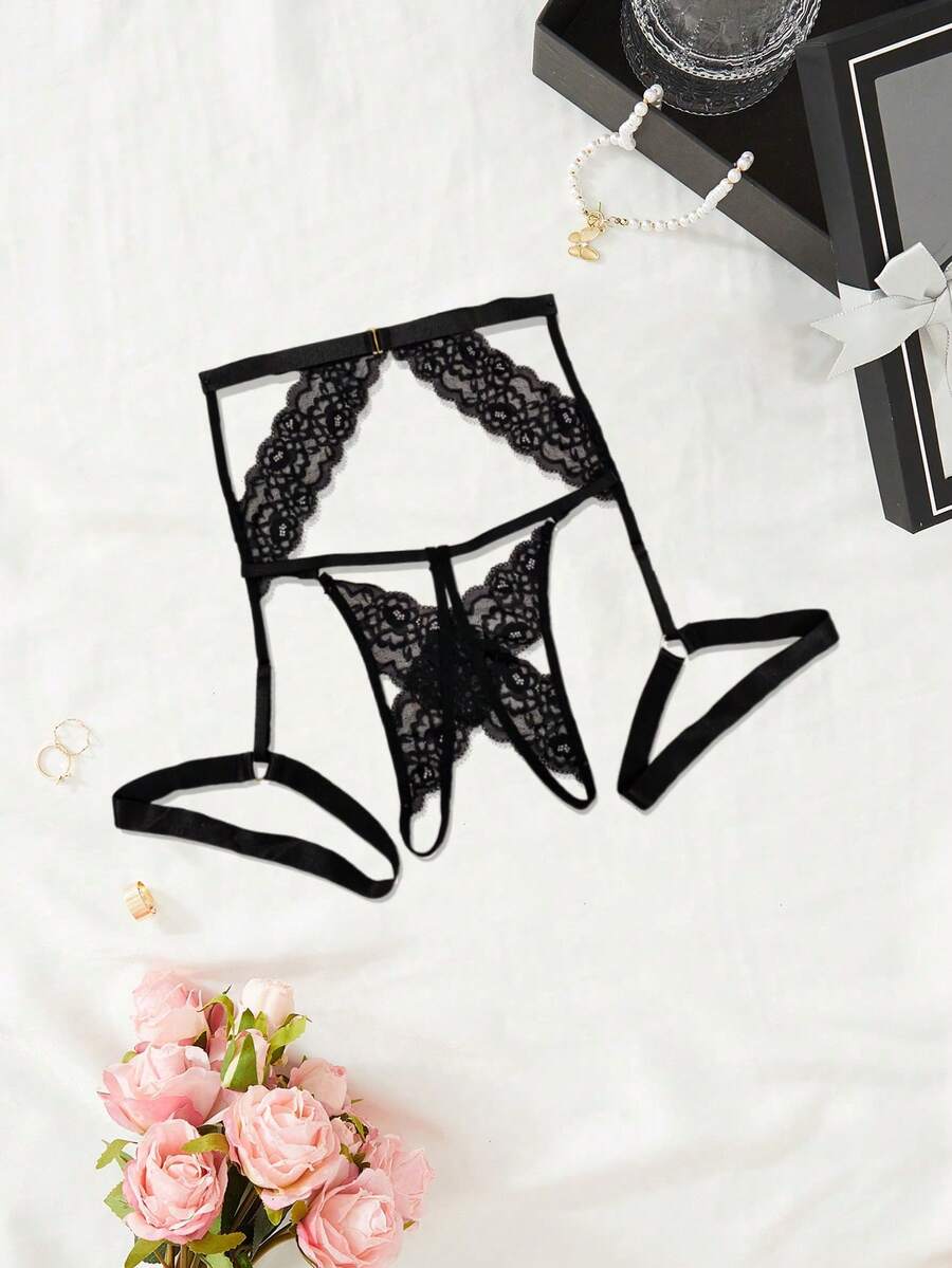 2-piece set of black low rise lace thong panties for women featuring cut out details