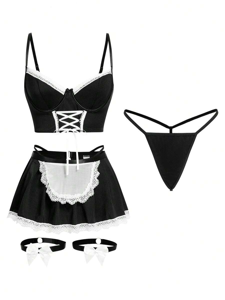 5-piece black and white women's lingerie set featuring an underwire bra, thong, garter belt, and two bowknot leg garters with lace-up details.