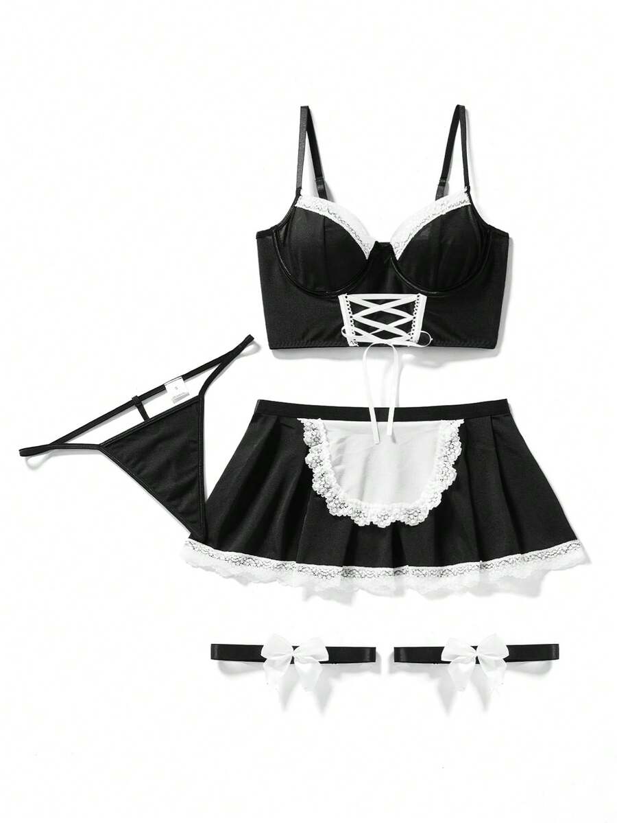 5-piece black and white women's lingerie set featuring an underwire bra, thong, garter belt, and two bowknot leg garters with lace-up details.