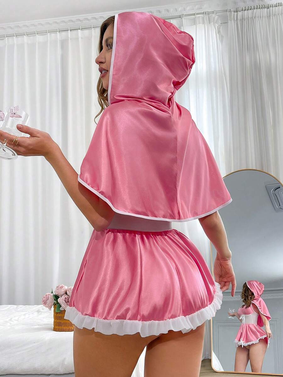 Women's 2-piece pink Halloween costume dress featuring a satin dress with contrast lace trim, ruffle hem, adjustable spaghetti straps, and a matching shawl.