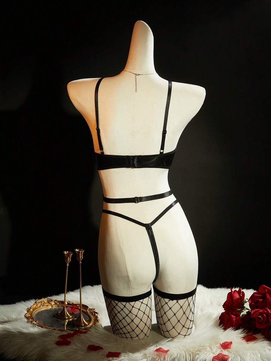 Black 6-piece sexy lingerie set with sheer cut-out top, underwire support, low-rise thong, fishnet details, and nipple pasties.