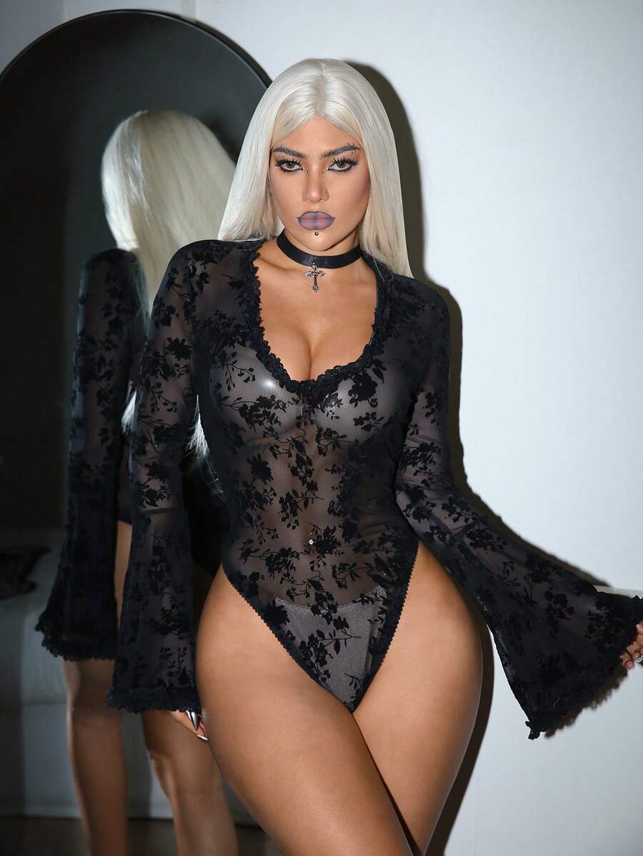 Black sheer long sleeve gothic bodysuit for women by Luvlette featuring a V-neck with knot detail and adjustable straps.