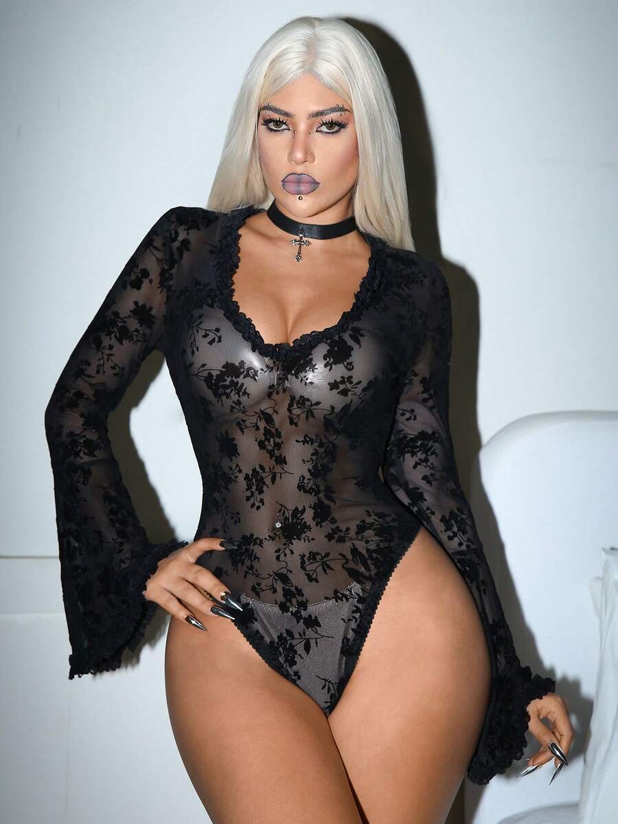 Black sheer long sleeve gothic bodysuit for women by Luvlette featuring a V-neck with knot detail and adjustable straps.