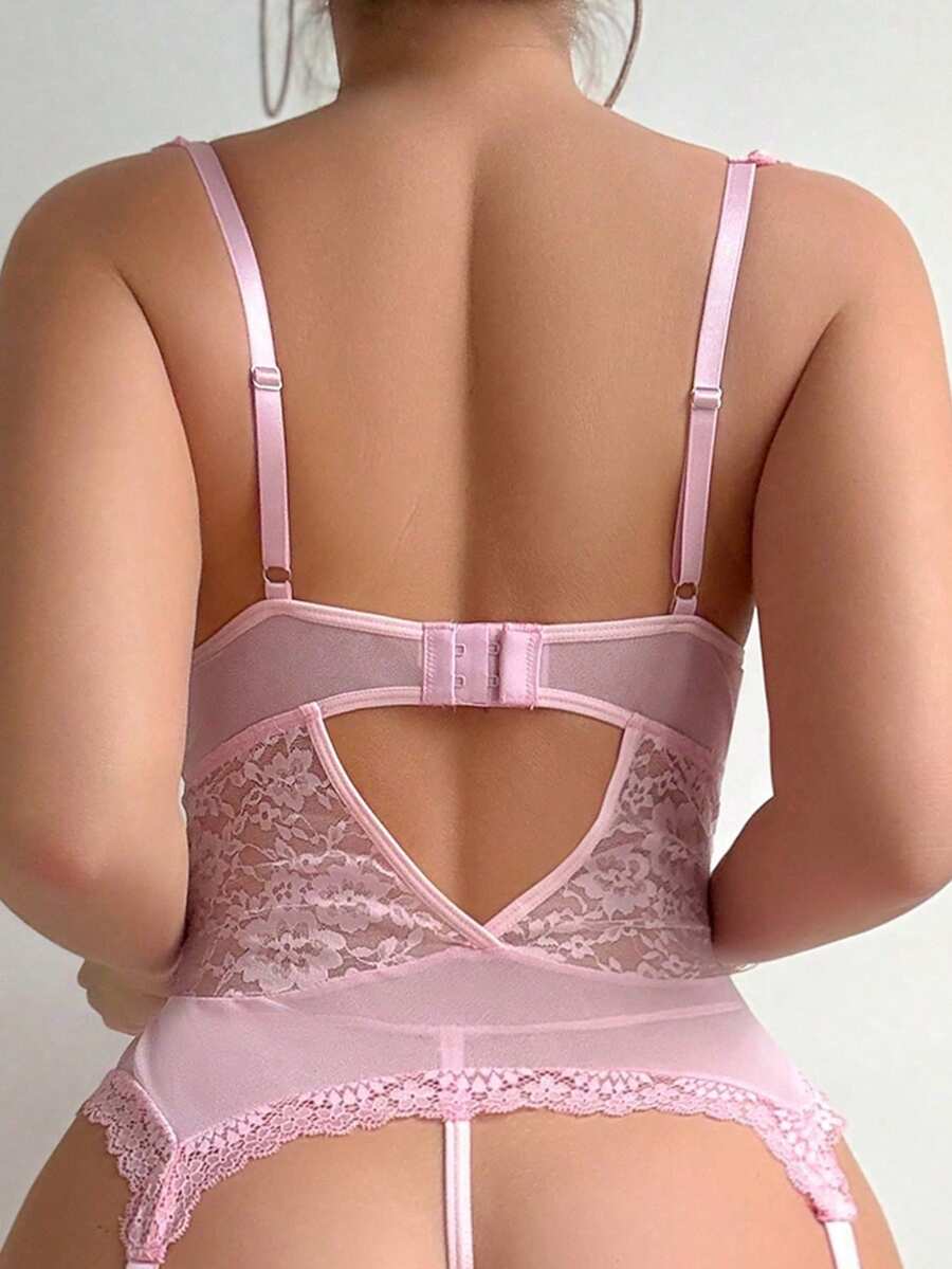 Women's 4-piece floral lace underwire garter corset lingerie set with adjustable straps, sheer mesh detail, low-rise V-string panty, and matching stockings.
