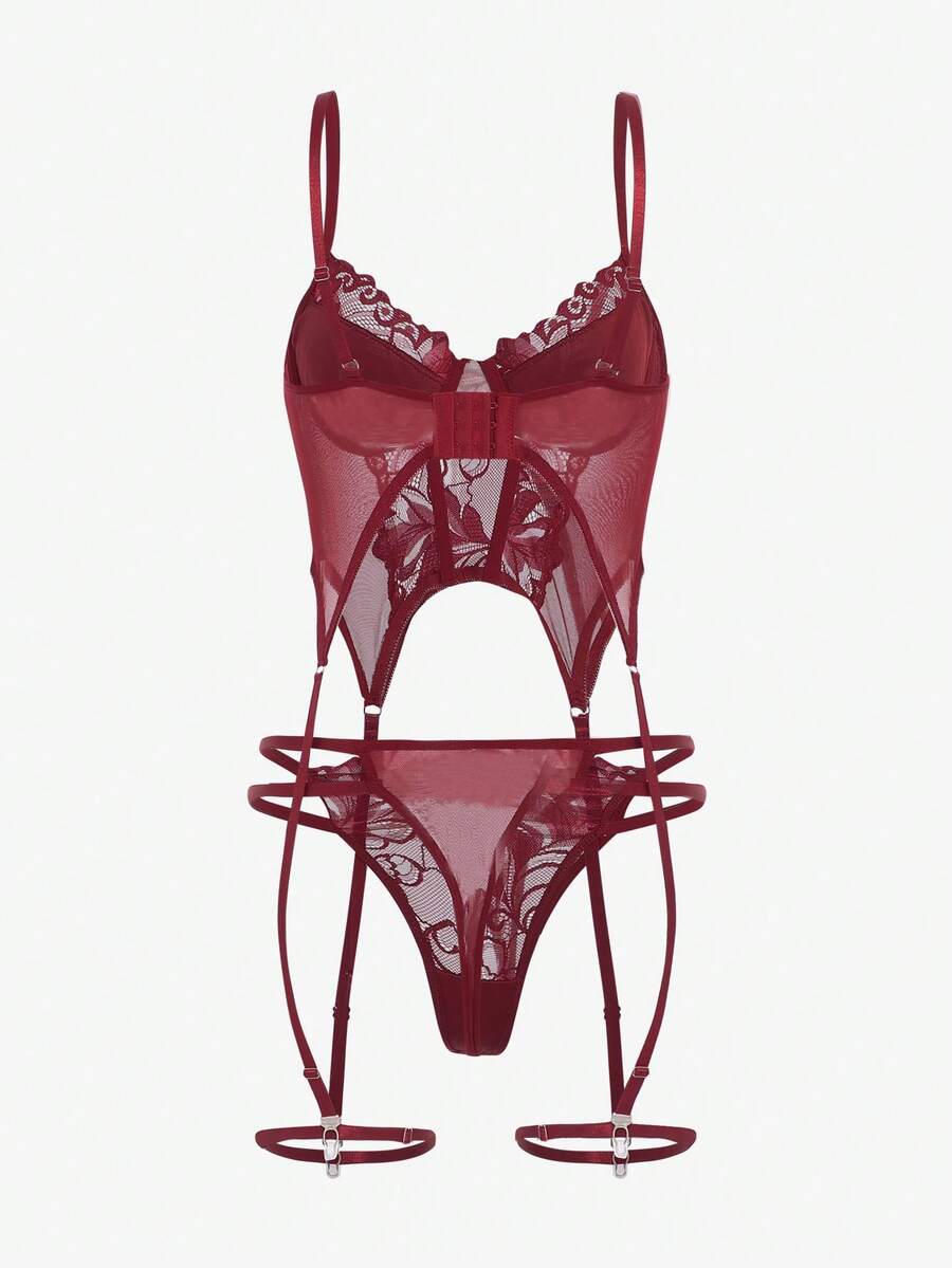 Women's black floral lace corset lingerie set featuring cut out details, underwire demi bra, adjustable straps, and matching thong.
